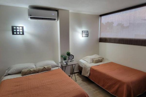 Bonito Departamento con 2 camas con clima, parking, wifi 110mb, ,cocineta, 8